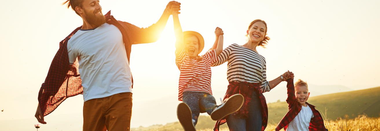 Parents having fun with children outdoor.