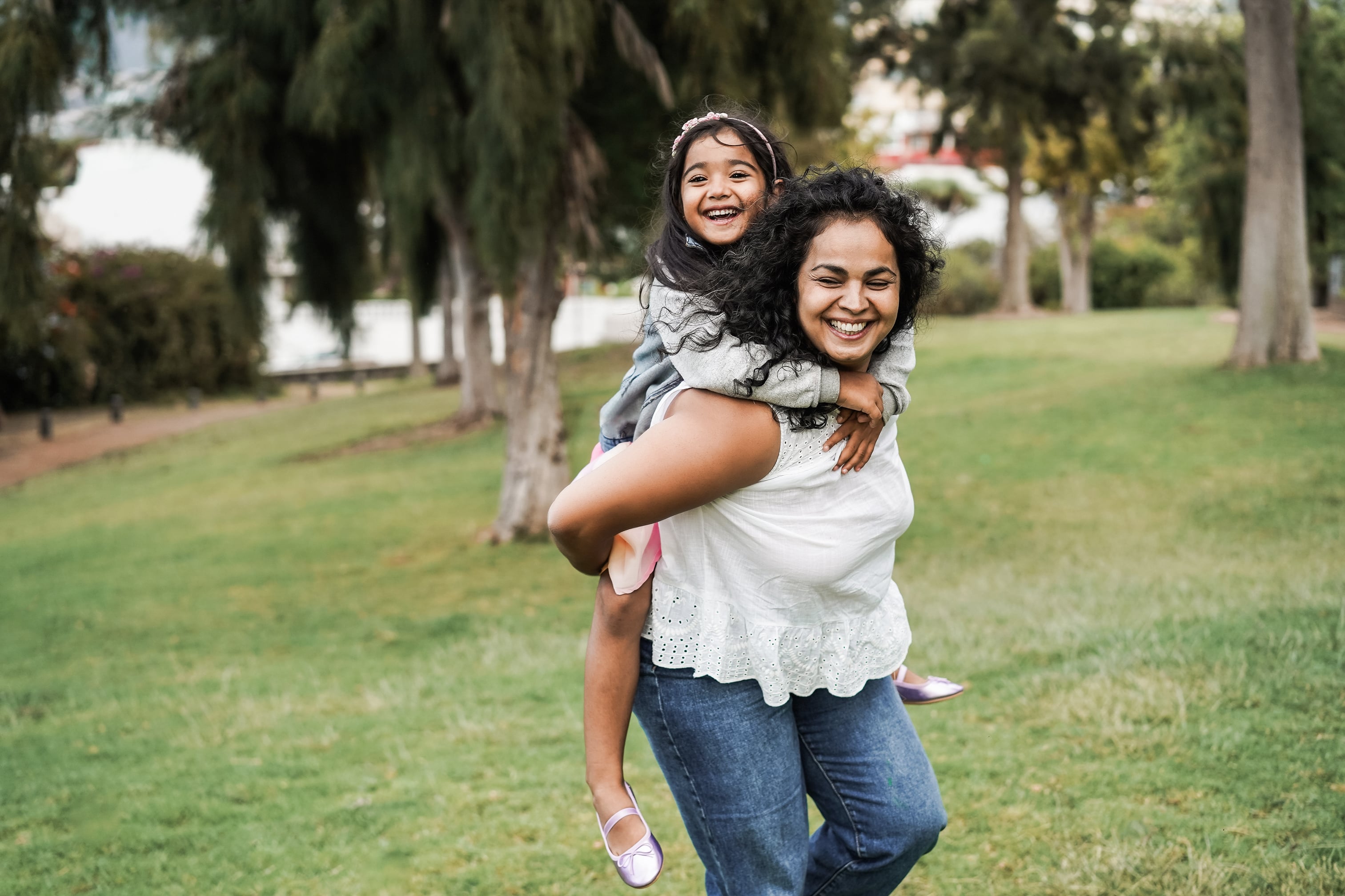 mother and daughter smiling
