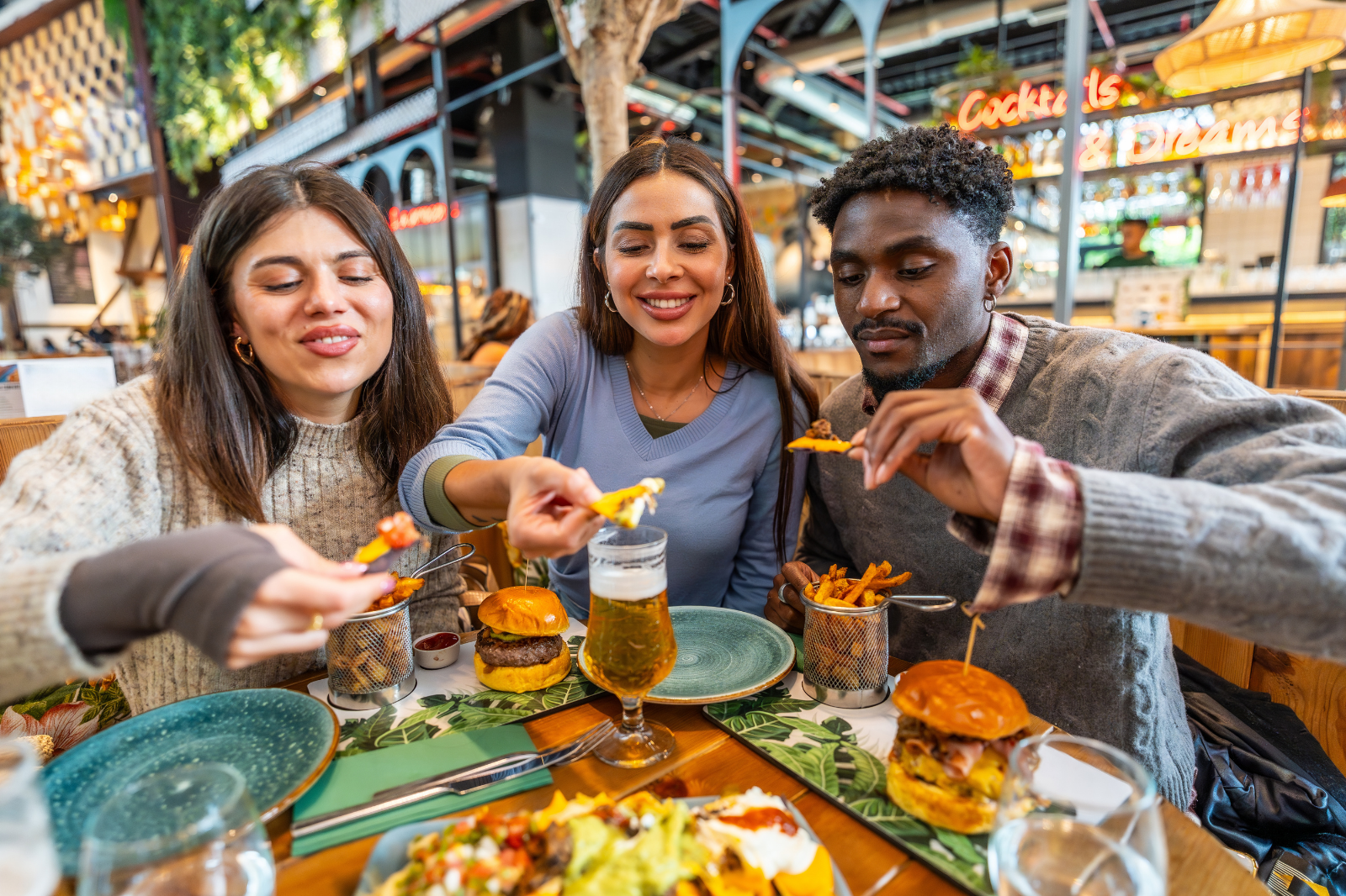 Friends eating happily